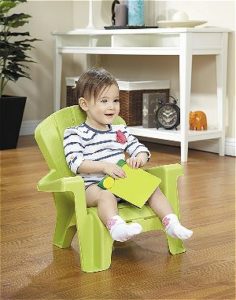 Kid in Green Plastic Adirondack Chair